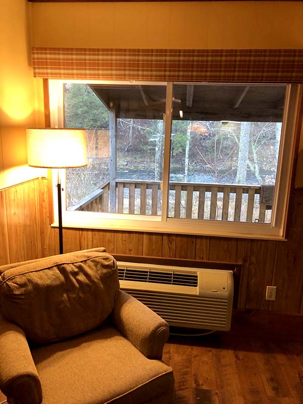 Cabin patio and deck overlooking the creek