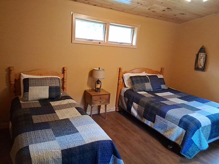 Cabin bedroom with fresh linens
