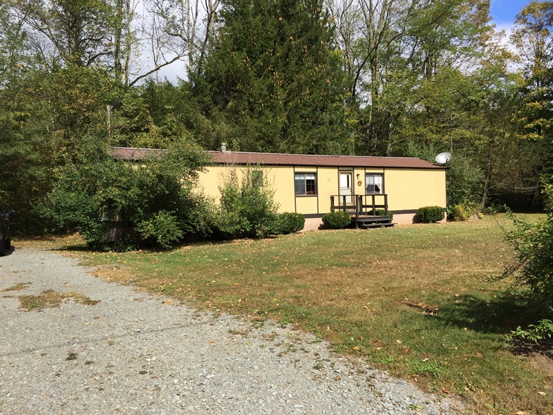 Trout Cottage exterior overlooking Willowemoc Creek